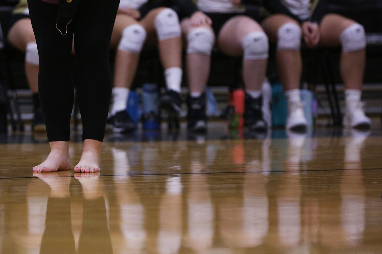 Carlene Landrey paced along the sidelines barefoot